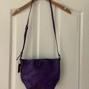 Small purple Coach bucket bag